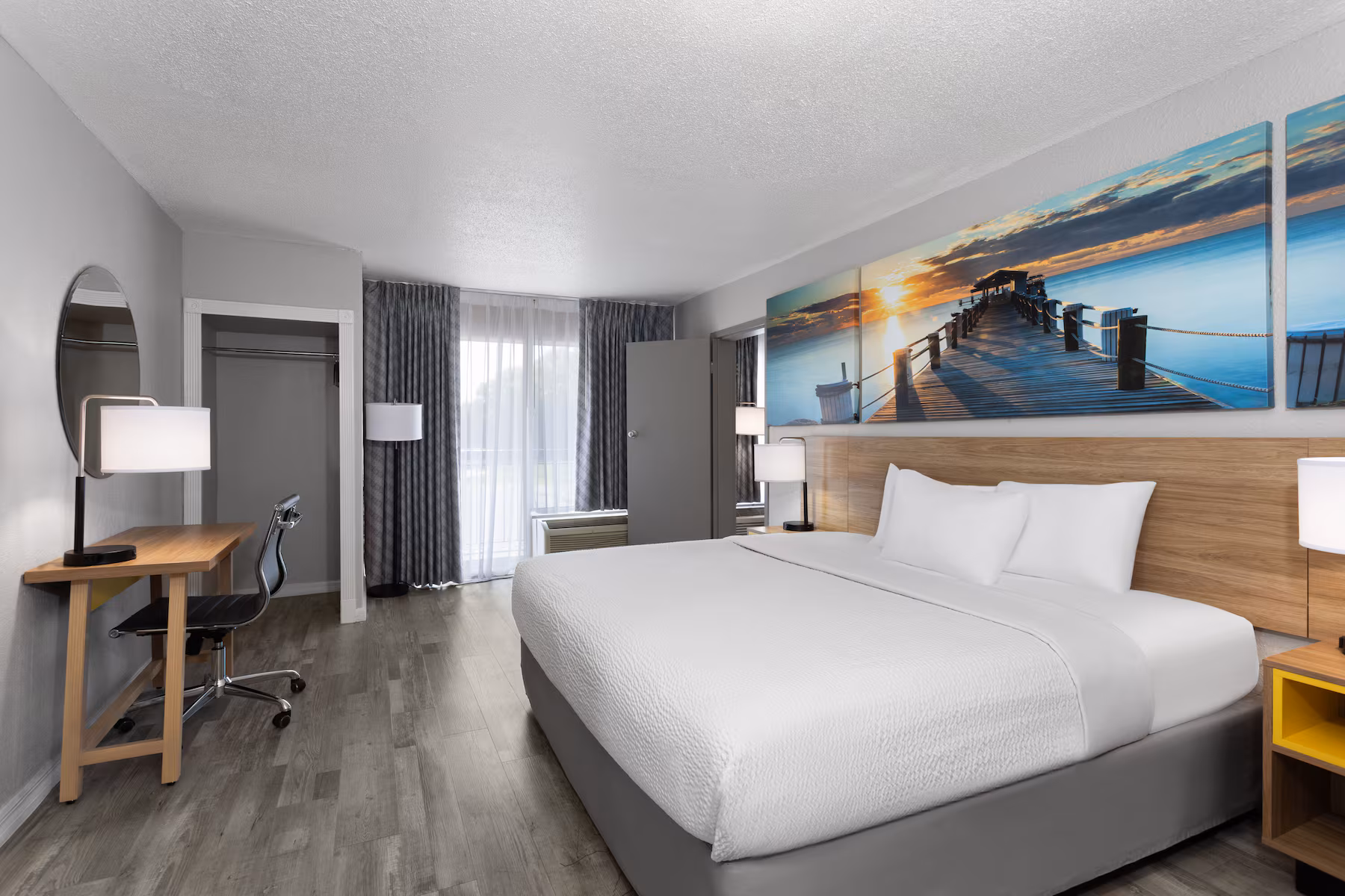 Suite bedroom with pier artwork